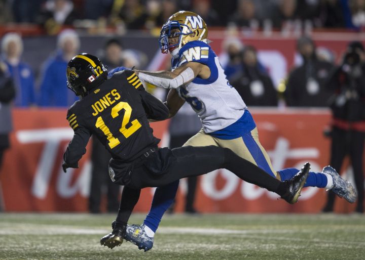 Winnipeg Blue Bombers' Mike Jones tackles Hamilton Tiger-Cats' Mike Jones during the second half of the 107th Grey Cup in Calgary, Alta., Sunday, November 24, 2019. 