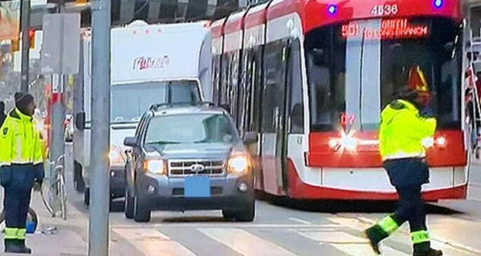 Toronto police say a driver was charged with assault after striking an officer with his car
.