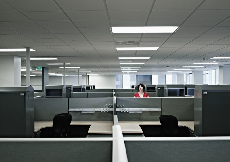 File photo of an office full of cubicles.