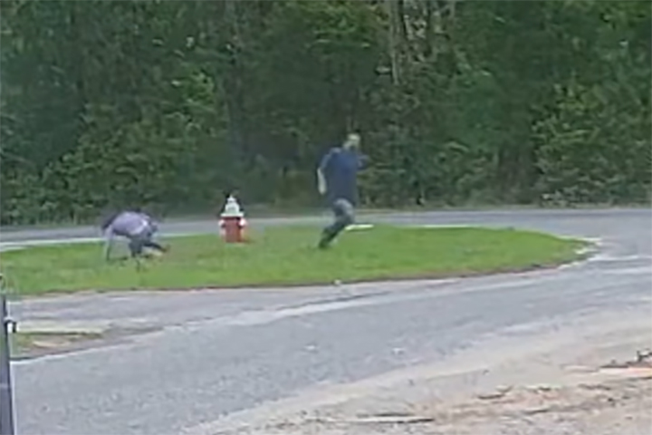 A girl, left, is shown after fighting off an alleged kidnapping attempt in West Pensacola, Fla., on May 18, 2021.