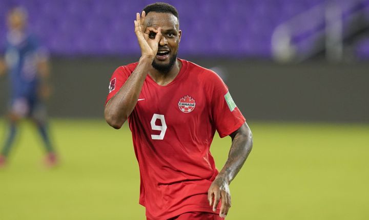 Canada forward Cyle Larin (9) gestures after scoring his third goal against Bermuda during the second half of a World Cup 2022 Group B qualifying soccer match, Thursday, March 25, 2021, in Orlando, Fla. 