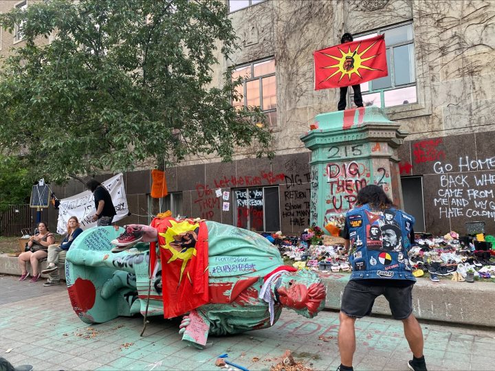 A photo of the Egerton Ryerson statue at Ryerson University in Toronto after being pulled to the ground. Credit: Global News