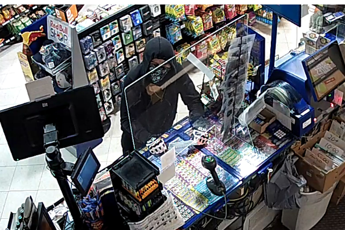 Waterloo Regional Police say they are looking to speak with this man in connection to a robbery in Cambridge.
