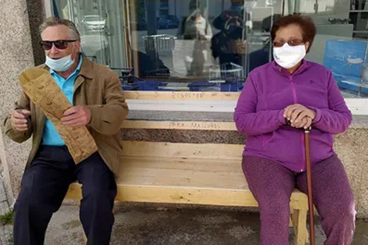 Manuel and Maria Souto are shown on the bench that he build in A Estrada, Spain.