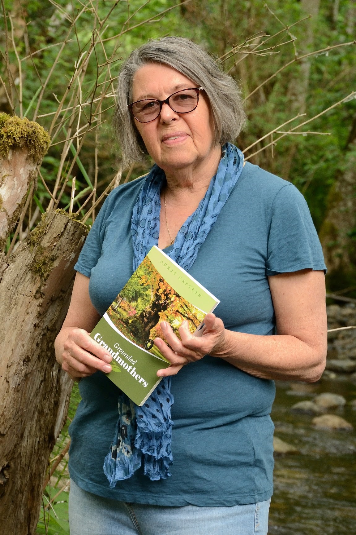 Author and grandmother, Aukje Kapteyn with her non-fiction book, Grounded Grandmothers.
