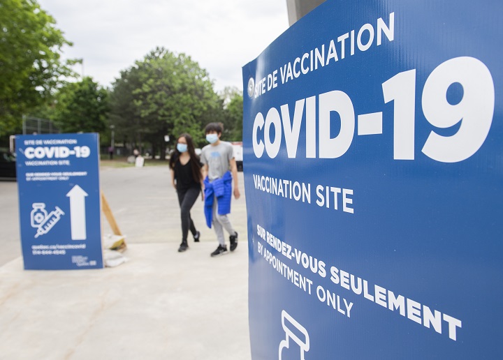 People are shown after receiving a COVID-19 vaccine shot at the Bill Durnan COVID-19 vaccination site in Montreal, Saturday, May 22, 2021, as the COVID-19 pandemic continues in Canada and around the world. 