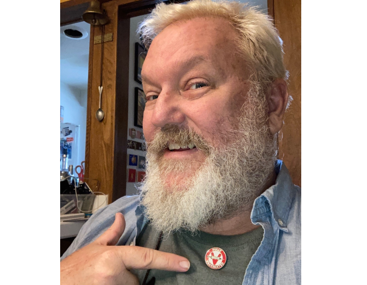 Mark W. Gray designed his ‘Fully Vaccinated’ pins in two days, he says