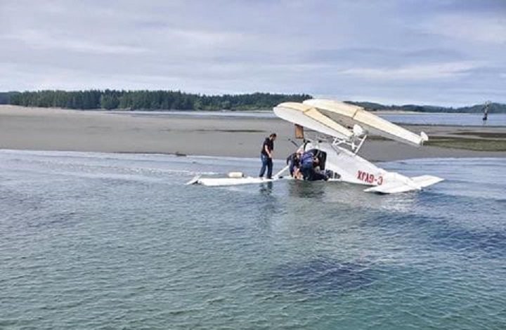 A floatplane flipped into the waters near Tofino, B.C. on July 26, 2021.