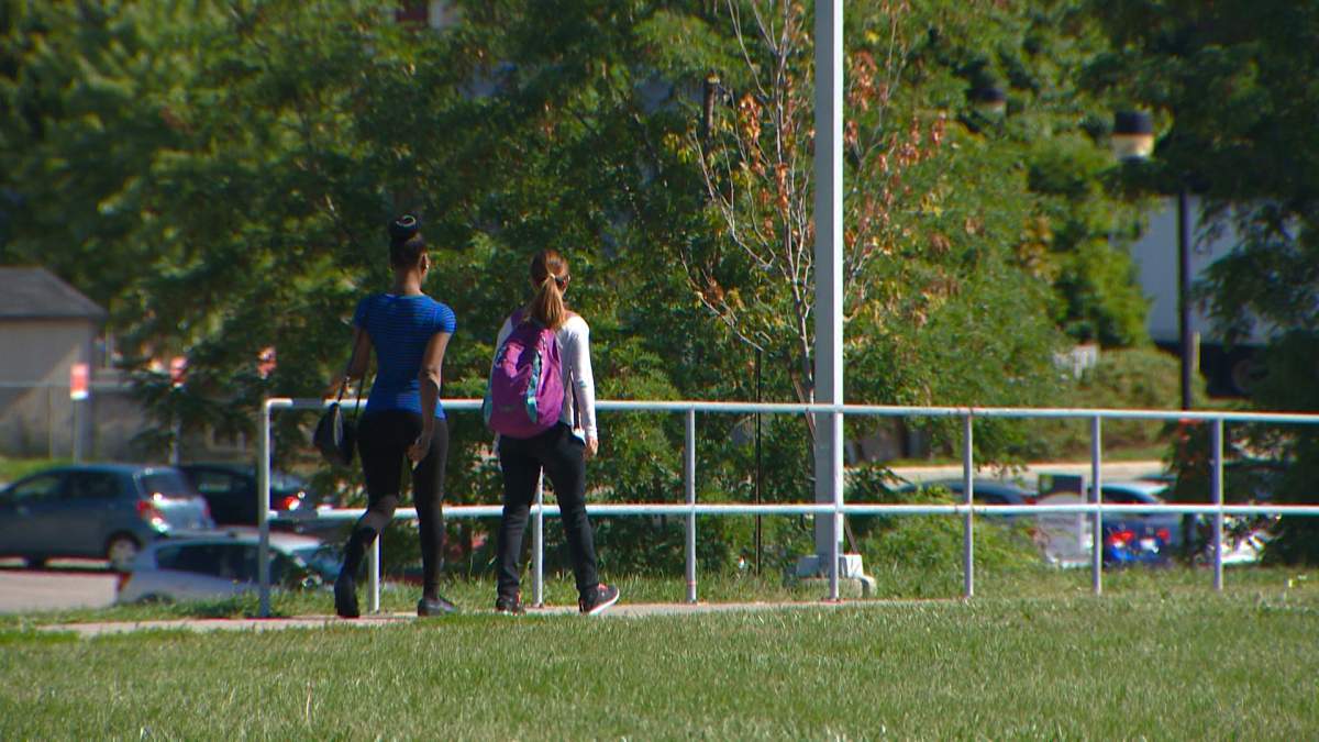 students walking kingston.