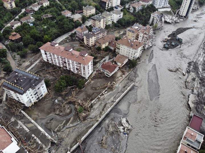 An aerial photo shows the destruction after floods and mudslides killed about three dozen people, in Bozkurt town of Kastamonu province, Turkey, Friday, Aug. 13, 2021.