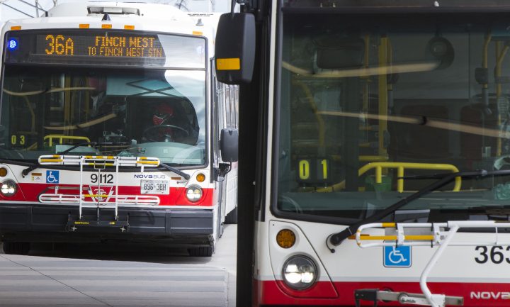A TTC bus driver wearing a face mask is seen on a bus in Toronto on Sept. 17, 2020.