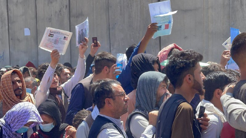 Afghan people who want to leave the country continue to wait around Hamid Karzai International Airport in Kabul, Afghanistan on Aug. 26, 2021.