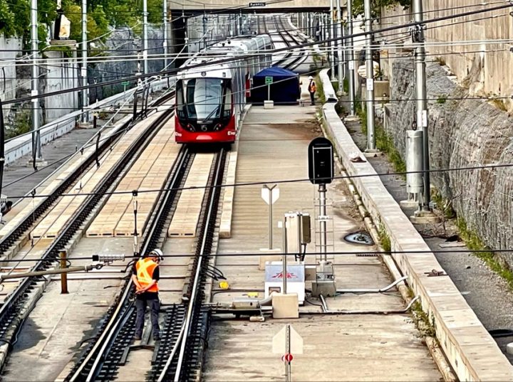Crews inspect the damaged Confederation Line train just east of Tunney’s Pasture station on Monday, Aug. 9, 2021. Councillors are calling for an emergency transit commission meeting to discuss the past week of issues on the line.