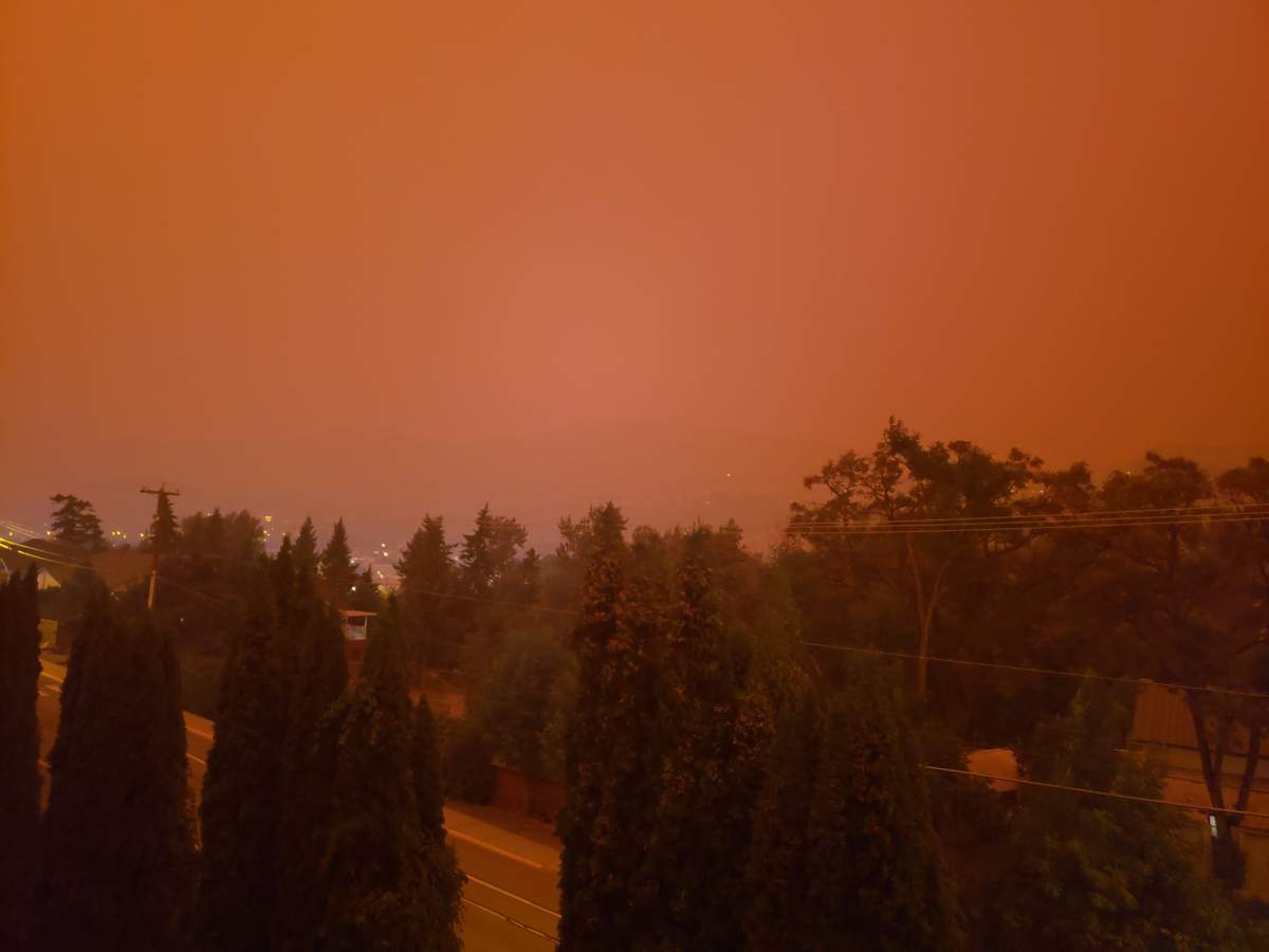 The surging White Rock Lake fire turned the sky dark on Sunday, August 15. This photo was taken in Vernon at 6:43 p.m.