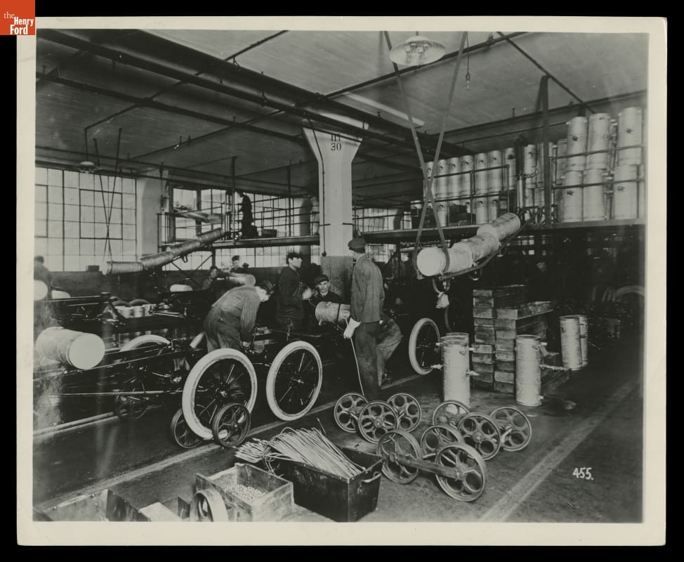 Workers on the Ford Motor Company assembly line circa 1914