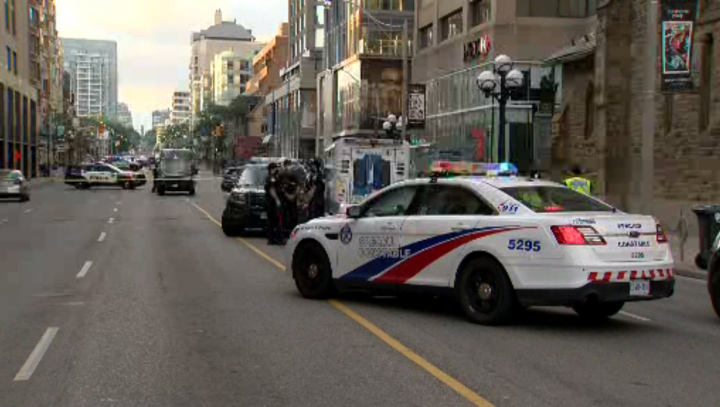 Emergency crews at the scene of the collision in the area of Avenue Road and Bloor Street.