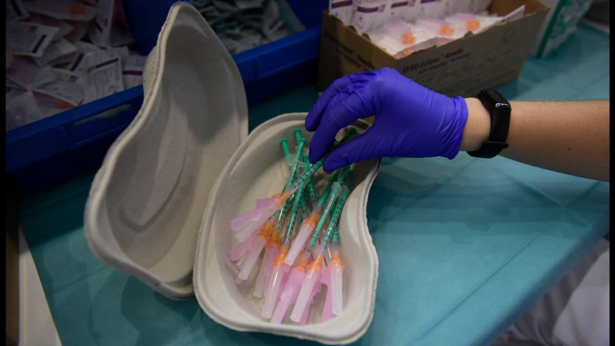 File photo, a health worker prepares Pfizer-BioNTech vaccines. (AP Photo/Alvaro Barrientos, File) .