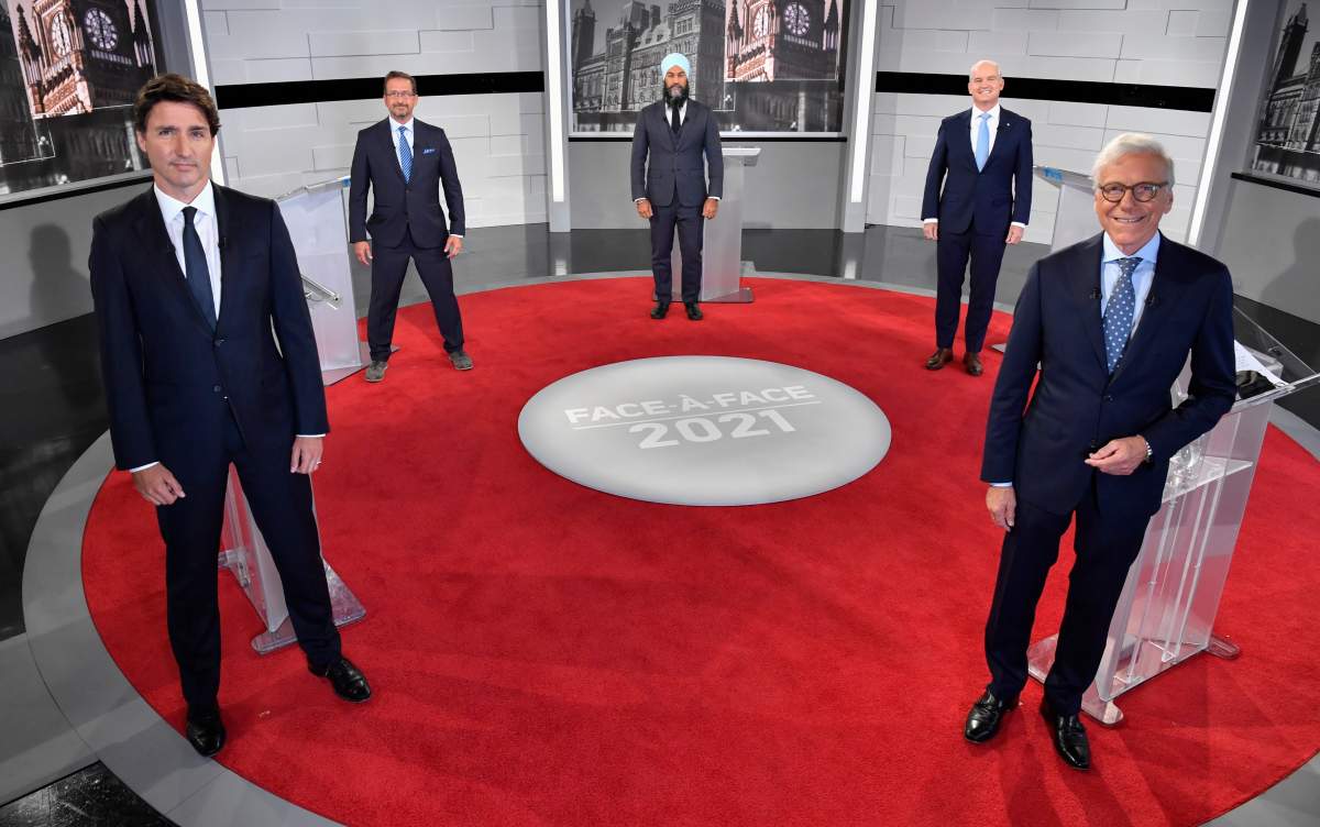 Liberal Leader Justin Trudeau, left to right, Bloc Quebecois Leader Yves-Francois Blanchet, NDP Leader Jagmeet Singh, Conservative Leader Erin O’Toole and debate moderator Pierre Bruneau pose for a photo.