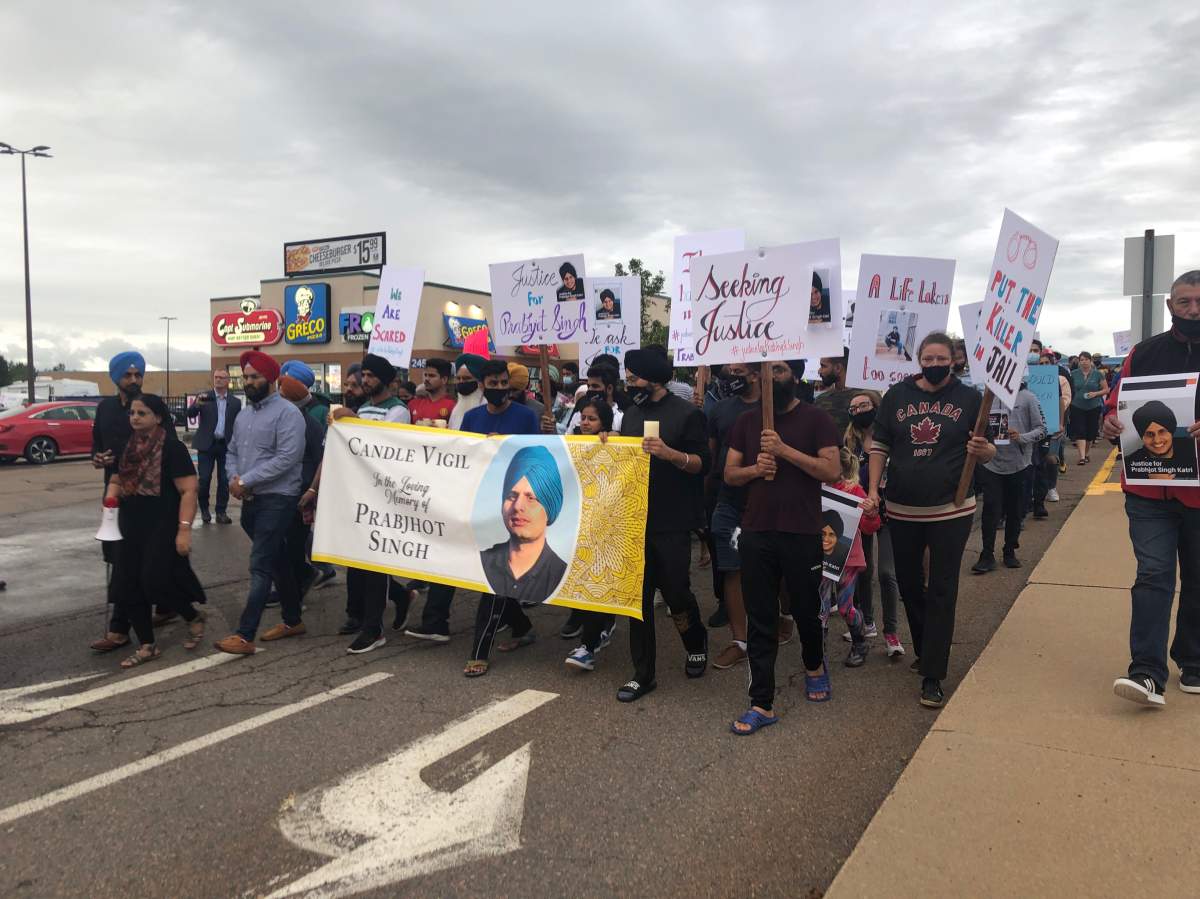 Mourners march the streets of Truro in memory of Prabhjot Singh Katri on Sept. 10.