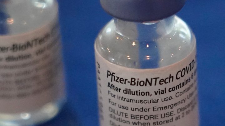 Empty bottles of the Pfizer COVID-19 vaccine await disposal by a nurse with the Jackson-Hinds Comprehensive Health Center in Jackson, Miss., across the street from Jackson State University, Tuesday, Sept. 21, 2021.