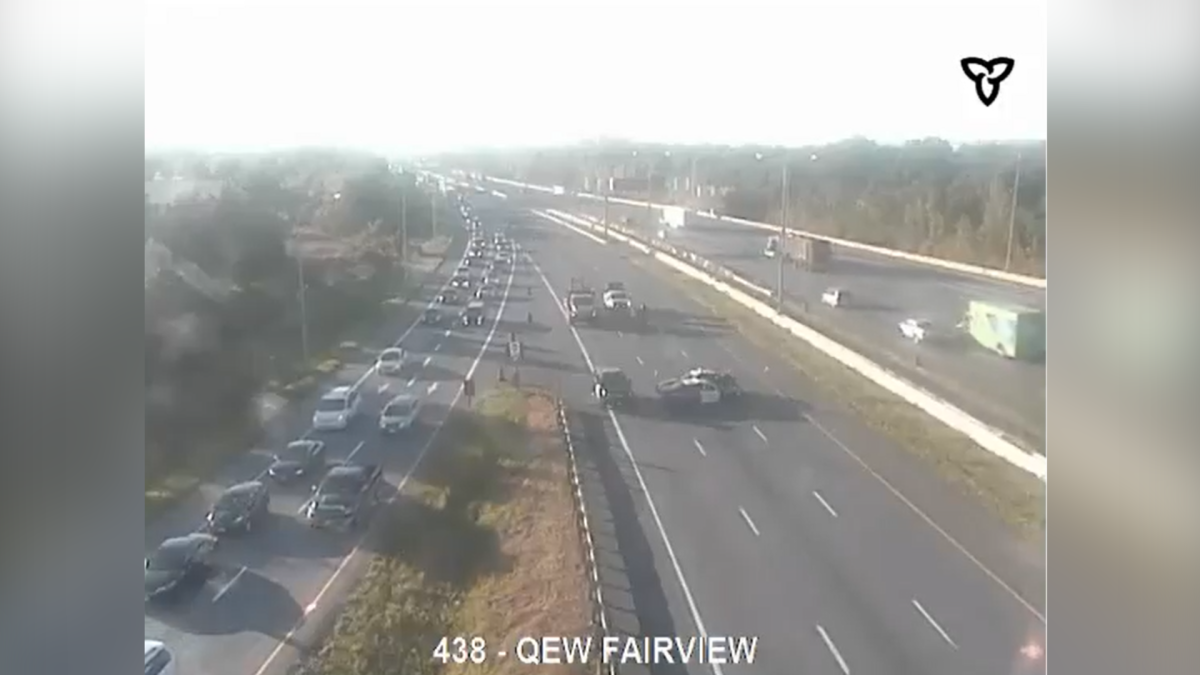 OPP says an early morning truck fire shut down the Toronto-bound lanes of the QEW in Burlington on Sept. 9, 2021.