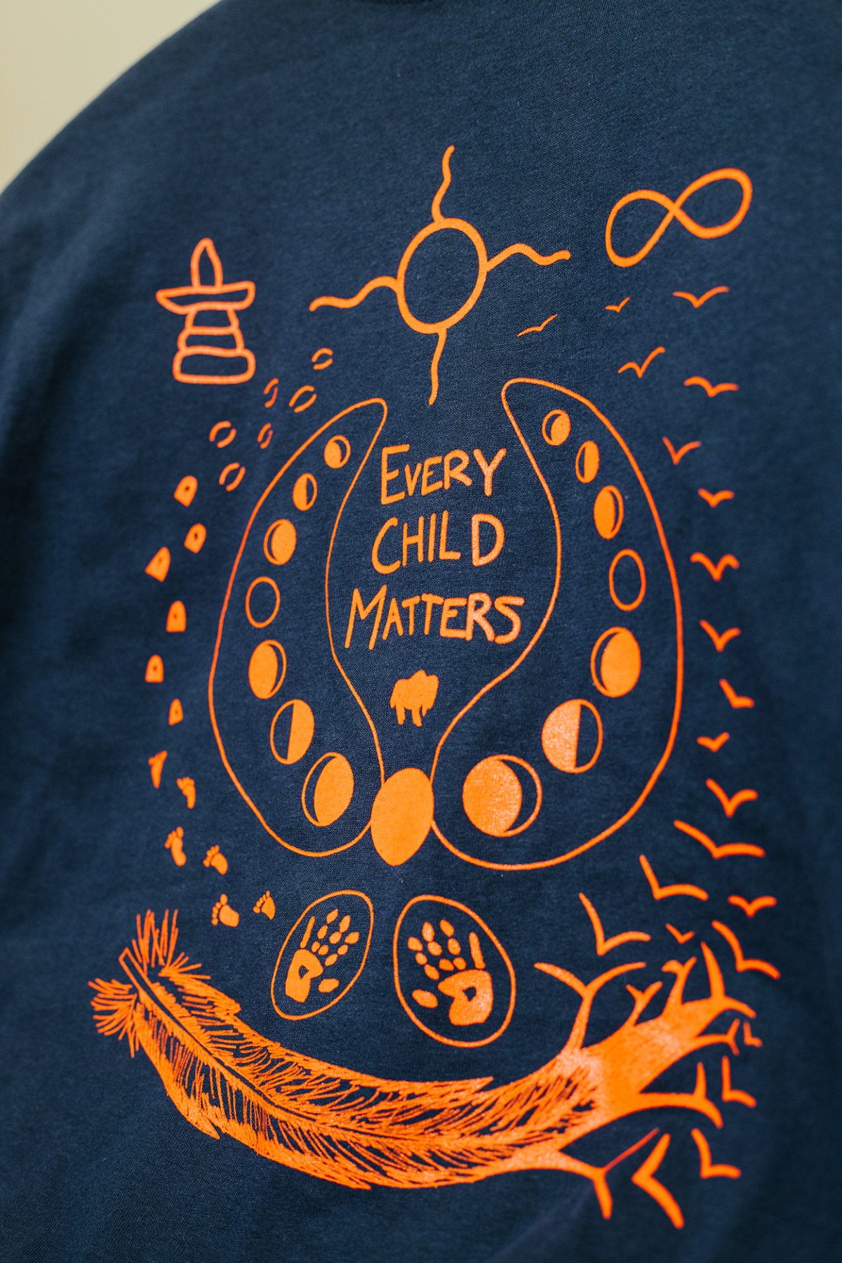 Chataya Holy Singer’s design for a shirt for Truth and Reconciliation Day commissioned by the University and the City of Lethbridge.