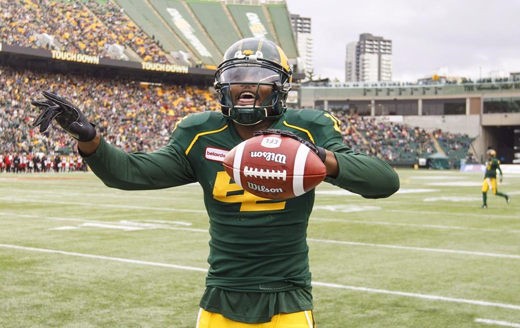 Edmonton's D'haquille (Duke) Williams (81) celebrates a touchdown during first half CFL action against the Calgary Stampeders, in Edmonton, Saturday, Sept. 8, 2018. The Saskatchewan Roughriders signed Williams, a free-agent receiver, on Monday.