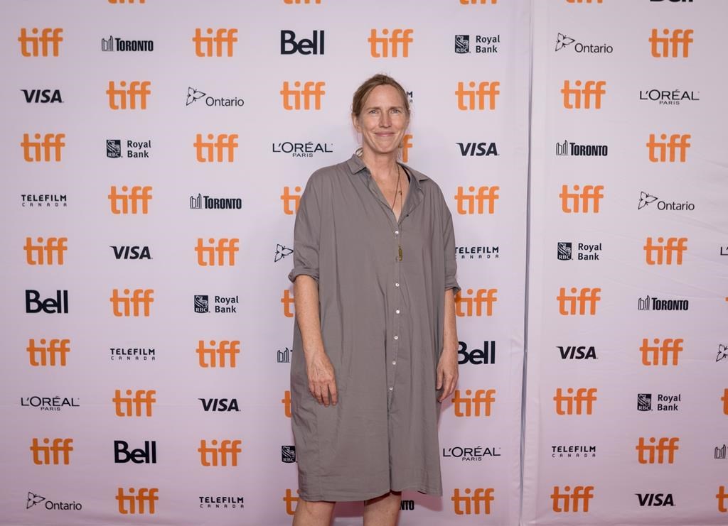Author Miriam Toews poses for a photograph on the red carpet premiere for the film 'All My Puny Sorrows' at the Princess of Wales Theatre during the 2021 Toronto International Film Festival in Toronto, Saturday, Sept. 11, 2021.