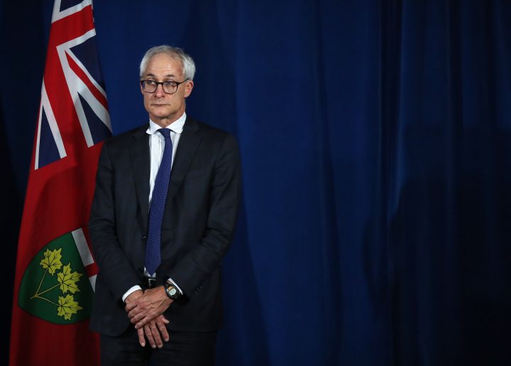 Ontario's chief coroner Dr. Dirk Huyer looks on during a COVID-19 press briefing at Queen's Park in Toronto on Tuesday, June 23, 2020.