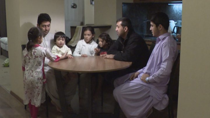 Haqmal and his family members are staying in three separate rooms at a hotel in Kyiv