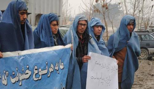 Basir Bita, centre, at women’s rights protest in Kabul, 2015.