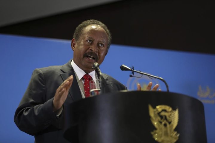 FILE - Sudanese Prime Minister Abdalla Hamdok announces new cabinet in Khartoum, Sudan, Feb. 8, 2021.