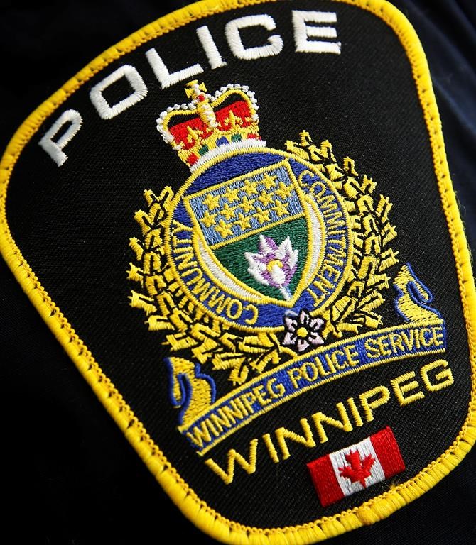 Photo of a Winnipeg Police Service shoulder badge on an officer in Winnipeg.