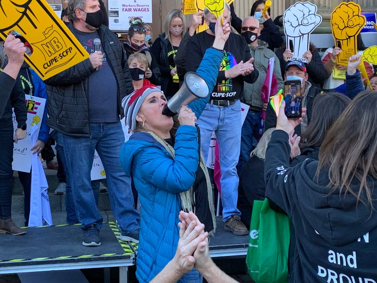 Thousands of protesters gather at N.B. legislature to support striking public workers - image