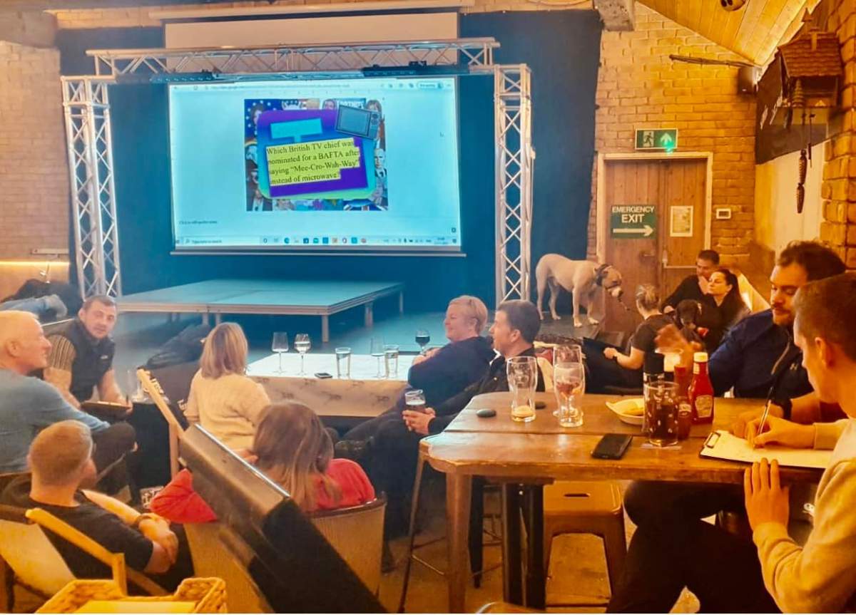 Guests at the Tan Hill Inn play trivia