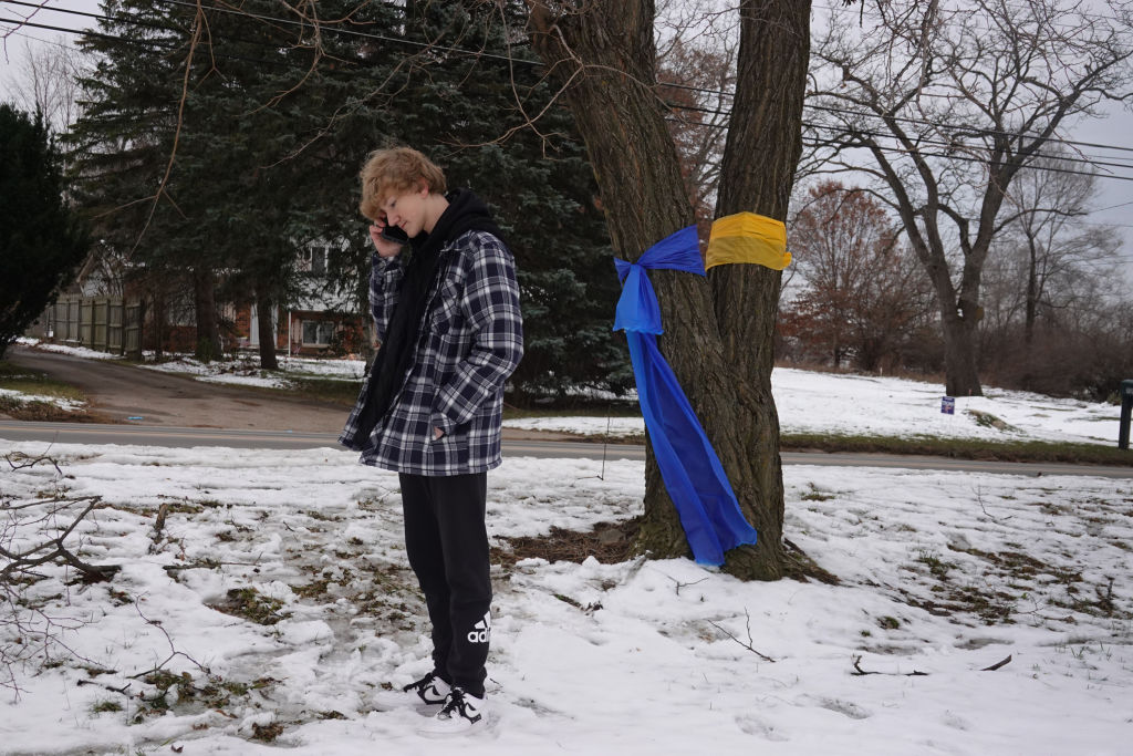 Logan Sweeney, a freshman at Oxford High School, speaks with a reporter about his experience during the shooting on December 01, 2021 in Oxford, Michigan.