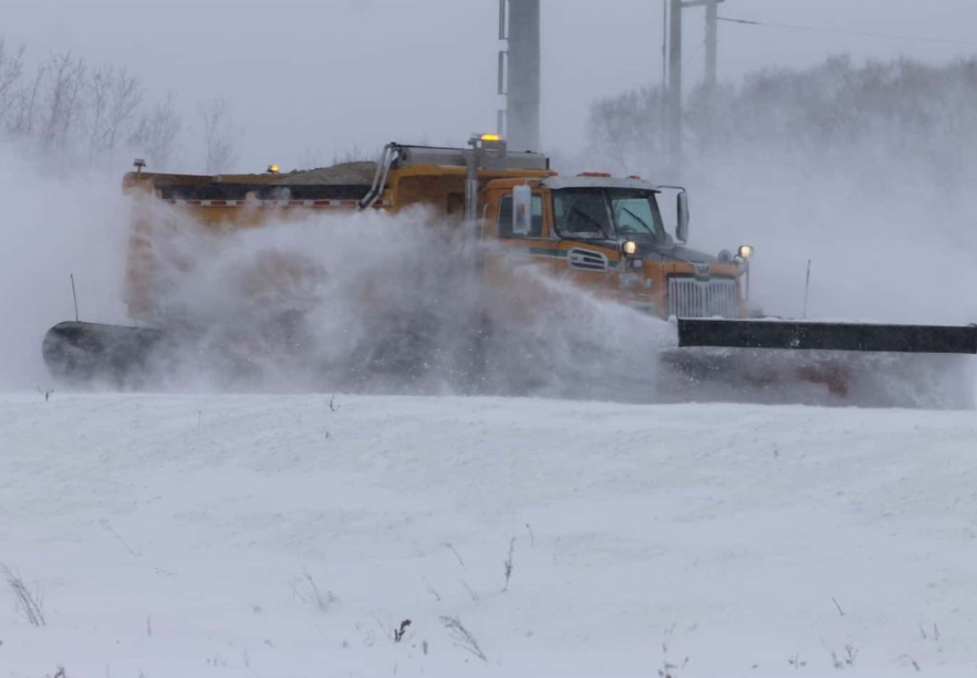 A snow plow is seen on a Manitoba highway in this file photo.