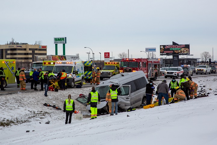 Emergency crews respond to the scene of a crash on Highway 20 West in Boucherville  on Monday, Dec. 27, 2021.