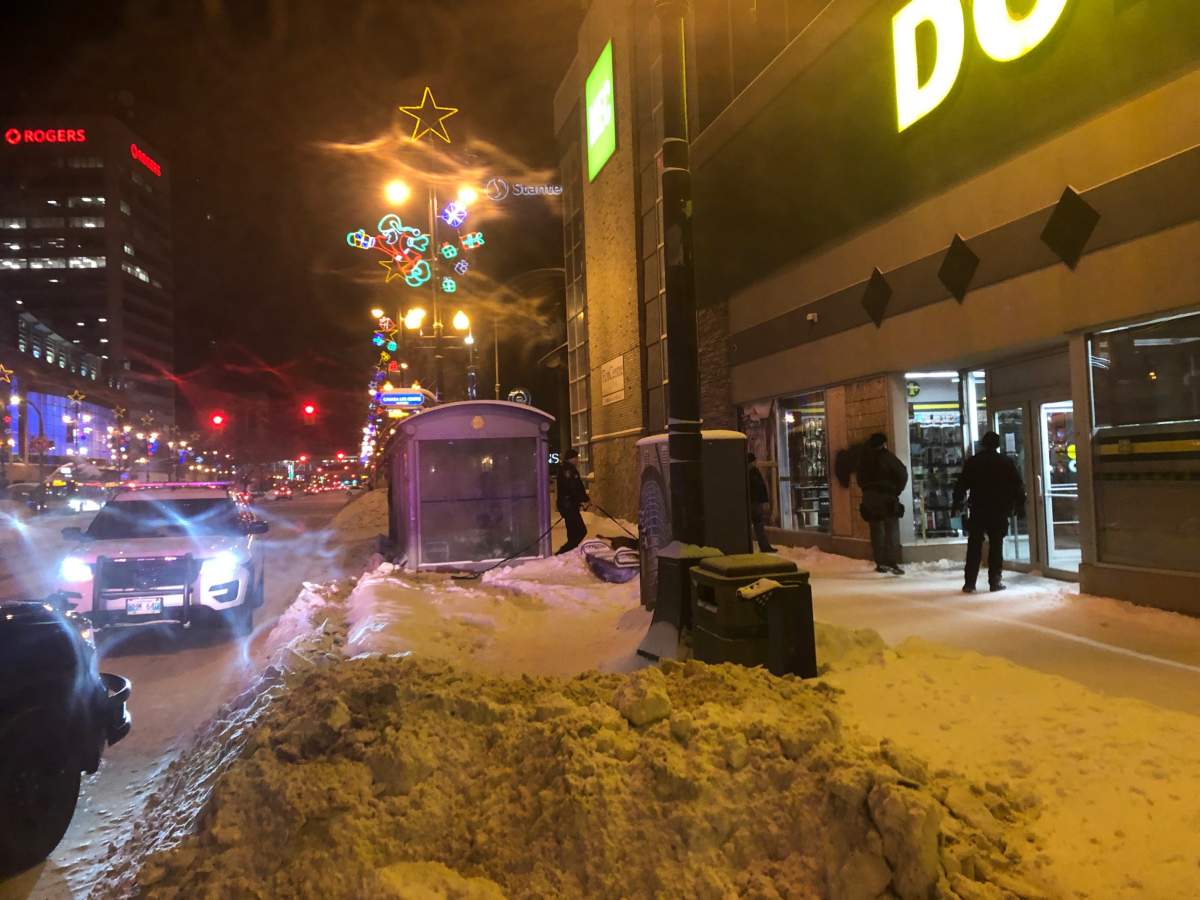 Winnipeg police respond to a break-in at the Dollarama on Portage Avenue at Donald Street Wednesday night.