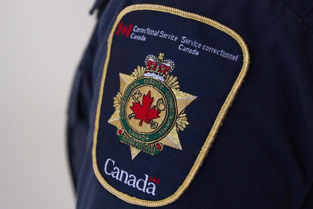 A shoulder patch on a correctional officer is shown at the Collins Bay Institution in Kingston, Ont., on Tuesday, May 10, 2016. 