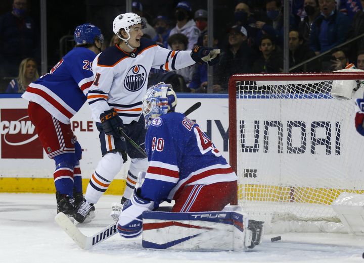 Edmonton Oilers’ Ryan McLeod (71) celebrates his goal against New York Rangers’ goalie Alexandar Georgiev (40) during the second period of an NHL hockey game Monday, Jan. 3, 2022, in New York.
