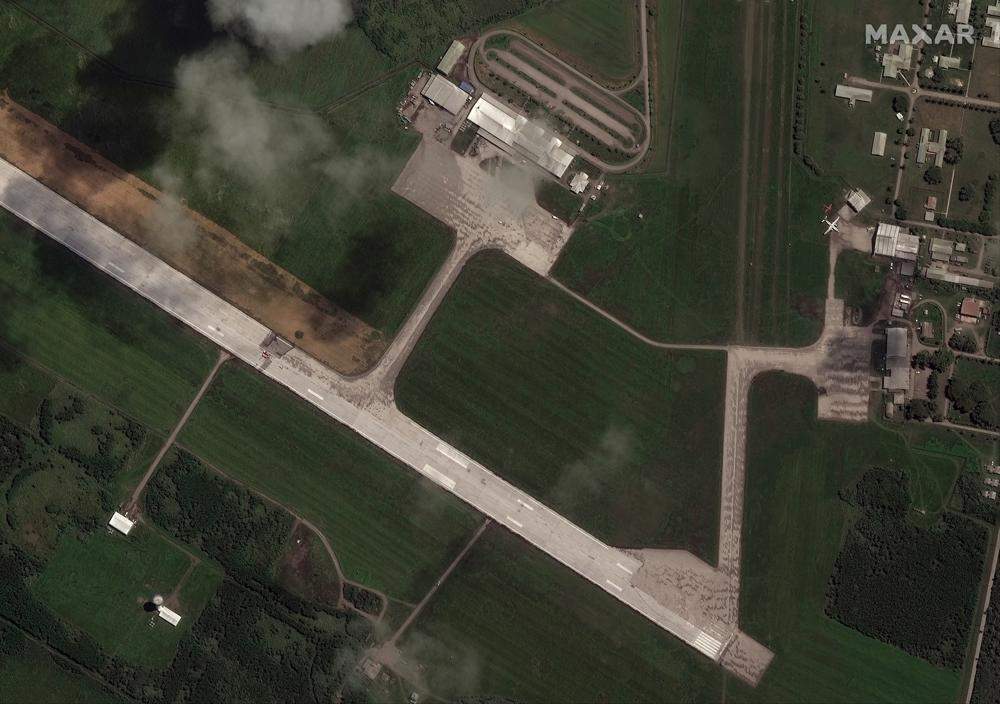 a satellite photo shows the Tonga airport runway cleanup