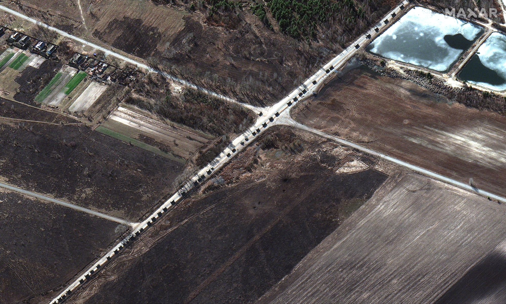 A large military convoy seen north of Kyiv stretches from near Antonov airport in the south to the northern end of the convoy near Prybirsk, Ukraine on Feb. 28, 2022..