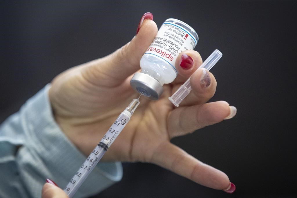 A vial of Moderna COVID-19 vaccine.