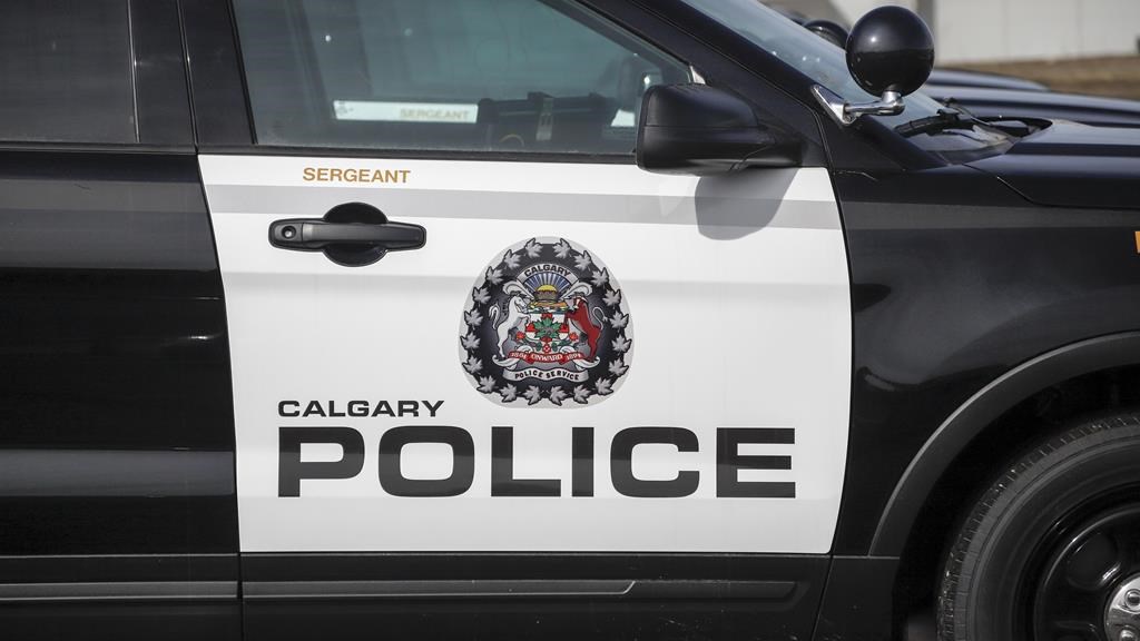 Police vehicles at Calgary Police Service headquarters in Calgary on April 9, 2020.