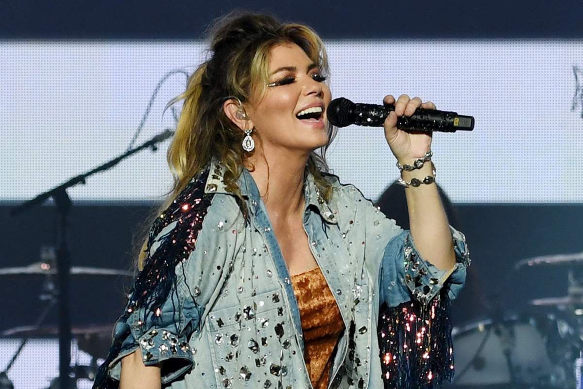 Shania Twain performs on stage.