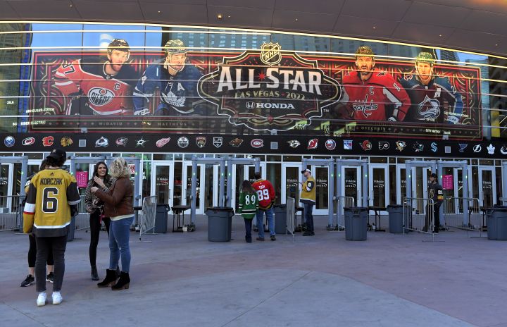 Fans line up before an NHL hockey game between the Vegas Golden Knights and the Buffalo Sabres at T-Moblie Arena Tuesday, Feb. 1, 2022, in Las Vegas. The arena is the site for this year’s NHL All-Star game.