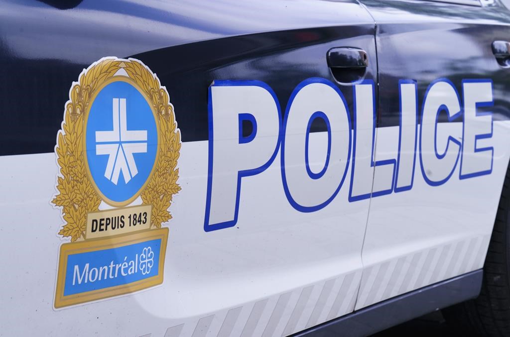 The Montreal Police logo is seen on a police car in Montreal on July 8, 2020. 