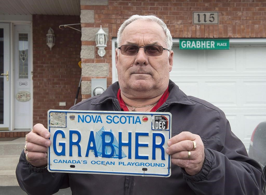 The Supreme Court of Canada will not hear an appeal by a Nova Scotia man who was seeking to reverse the revocation of his personalized licence plate bearing his surname, “Grabher.” Lorne Grabher displays his personalized licence plate in Dartmouth, N.S. on Friday, March 24, 2017. 