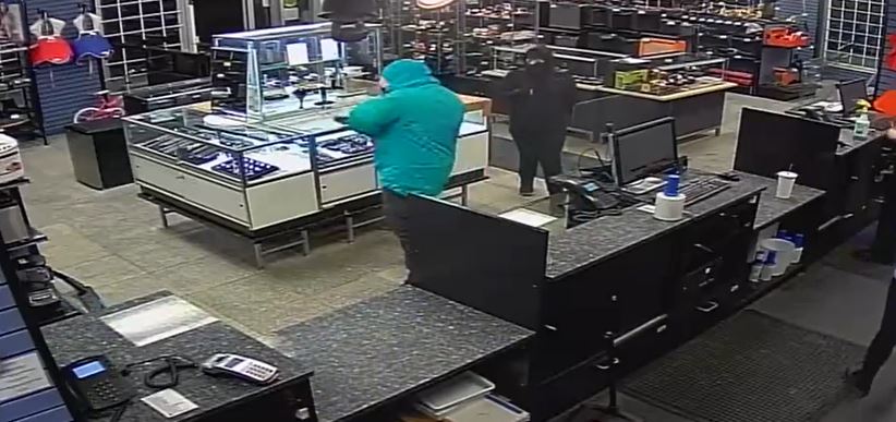 Edmonton police are hoping to identify a man and woman responsible for an armed robbery at a pawn shop in the area of 126 Avenue and Fort Road on Monday, Jan. 24, 2022.